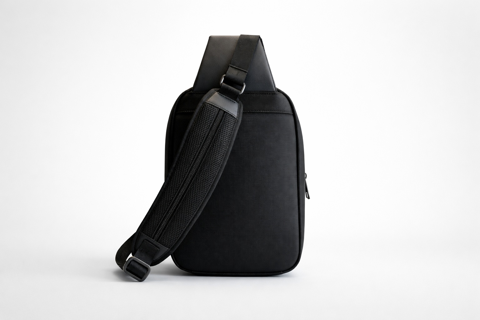 Rear view of DropBag showing its shoulder strap and back panel